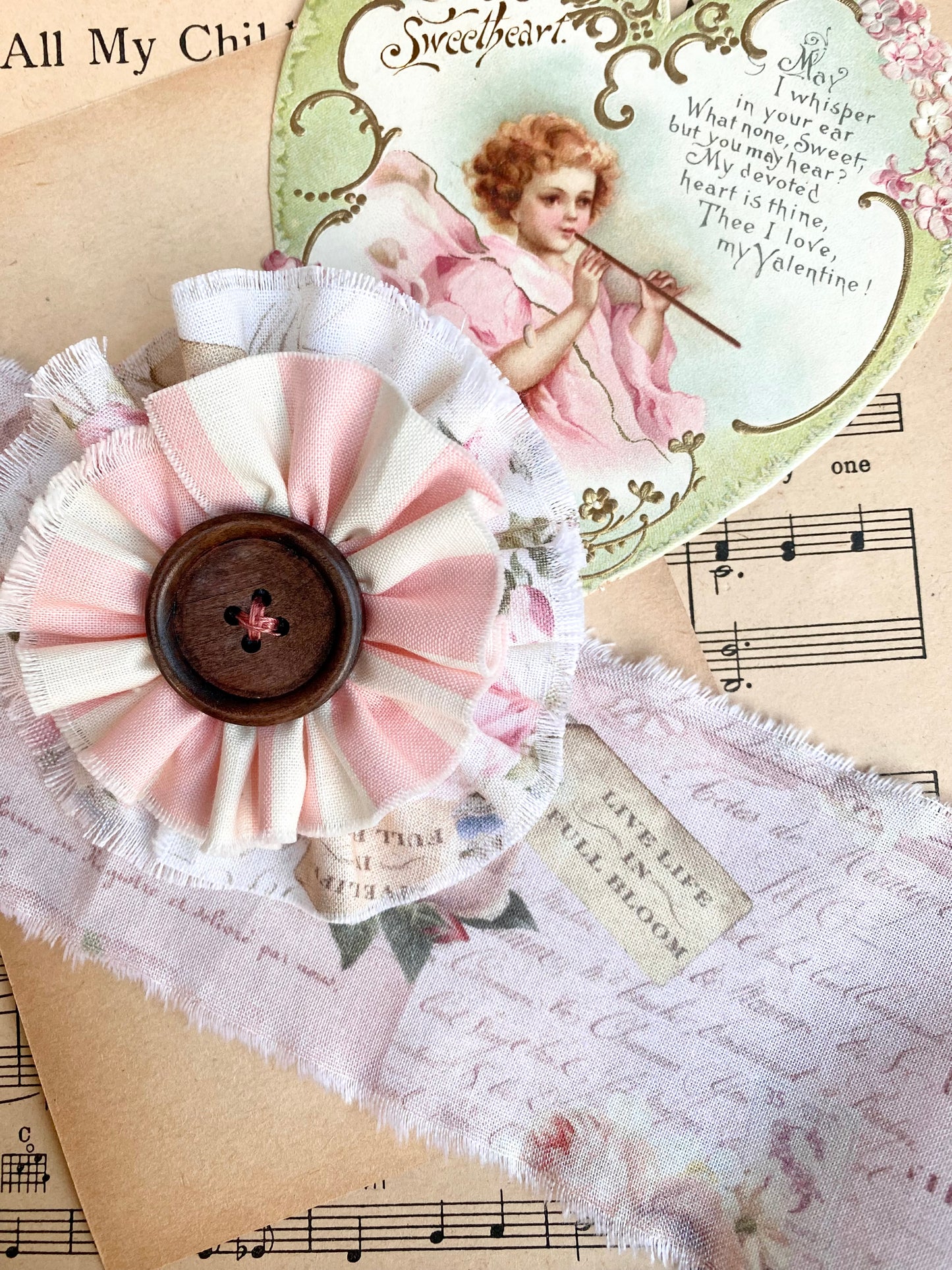 stripe and floral flower brooch.