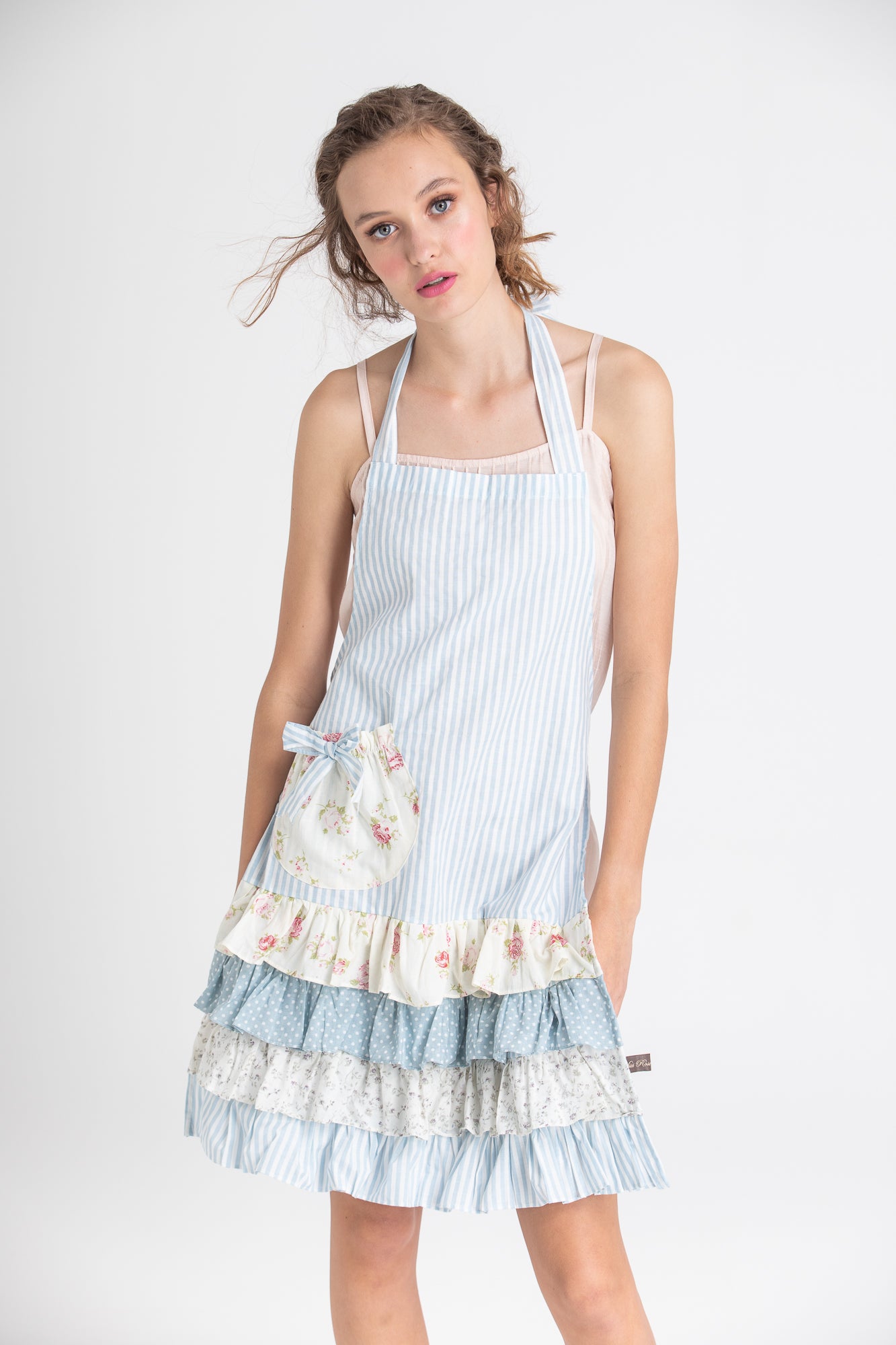 Floral and stripe apron. Blue