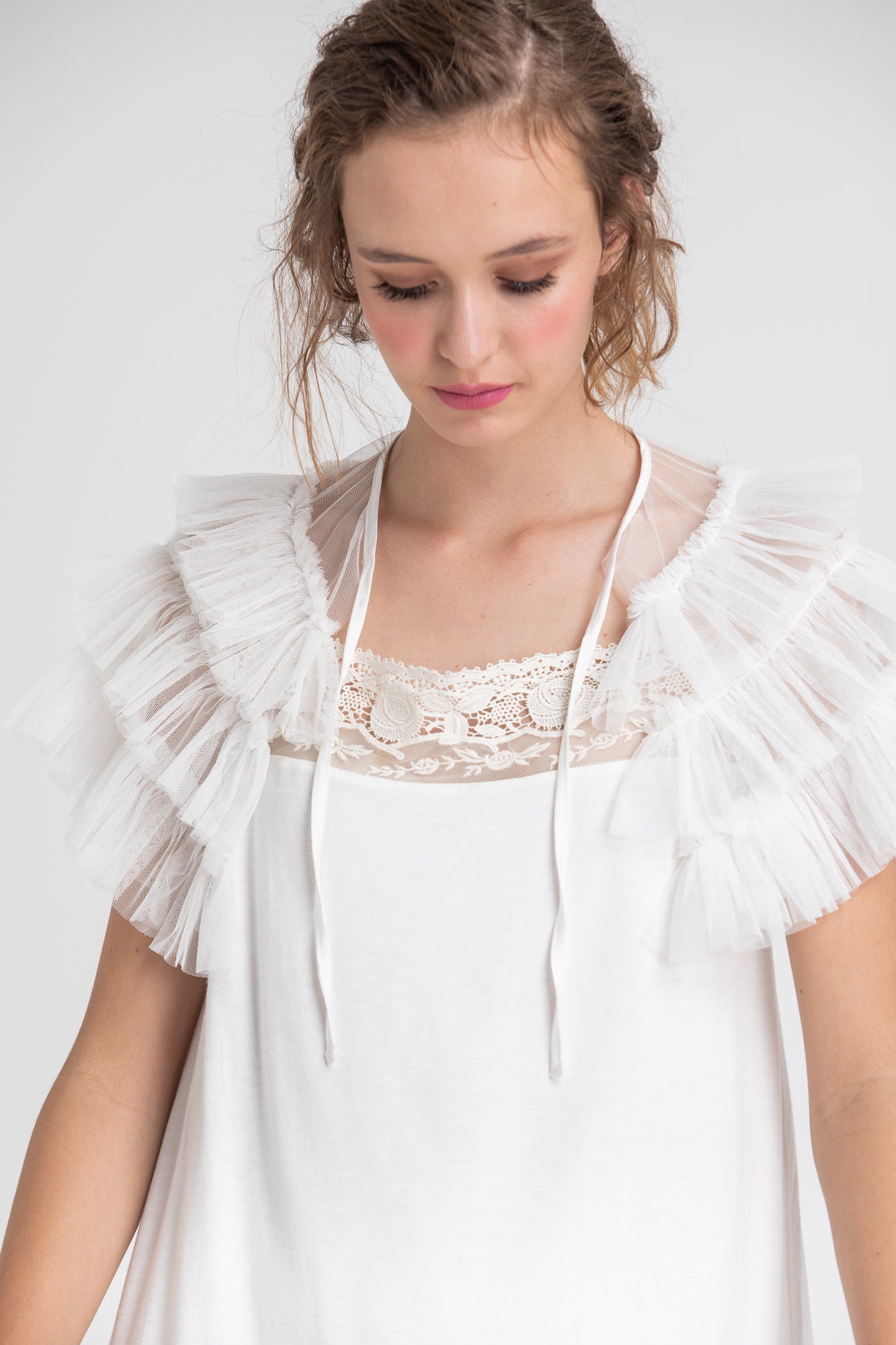 ruffled tulle Faerie cape in icing sugar white.