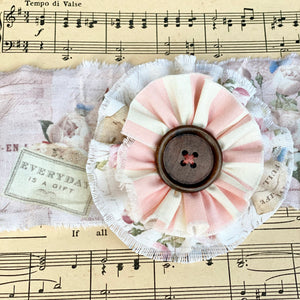 stripe and floral flower brooch.