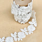 vintage rose garland lace on a wooden spool