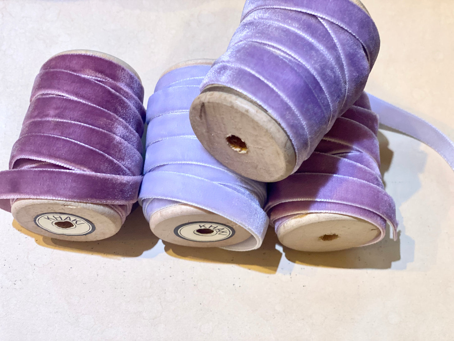 Lavender Palace collection of velvet ribbons on vintage wooden spools