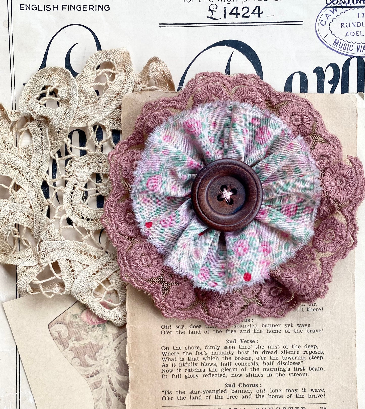 Vintage floral and lace brooch.