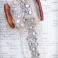 Baroque crystal and gold embroidered trim on net.