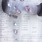 crystal button trim. pink and clear.