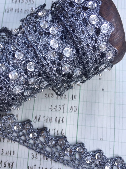 silver trim with crystals.