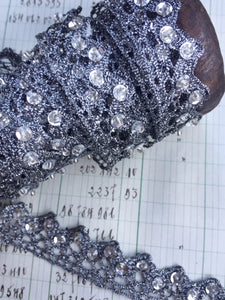 silver trim with crystals.