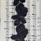 Beaded black rose lace trim.