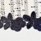 Beaded black rose lace trim.