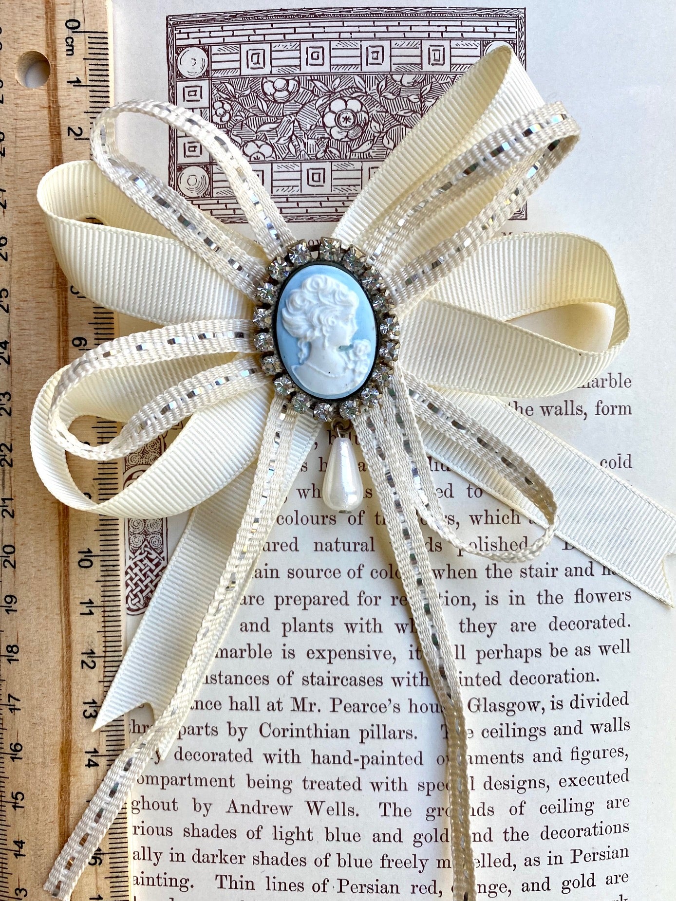 Vintage cameo and ribbon brooch.