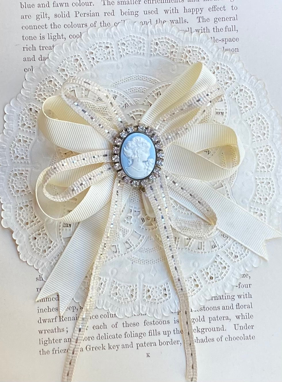 Vintage cameo and ribbon brooch.