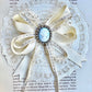 Vintage cameo and ribbon brooch.