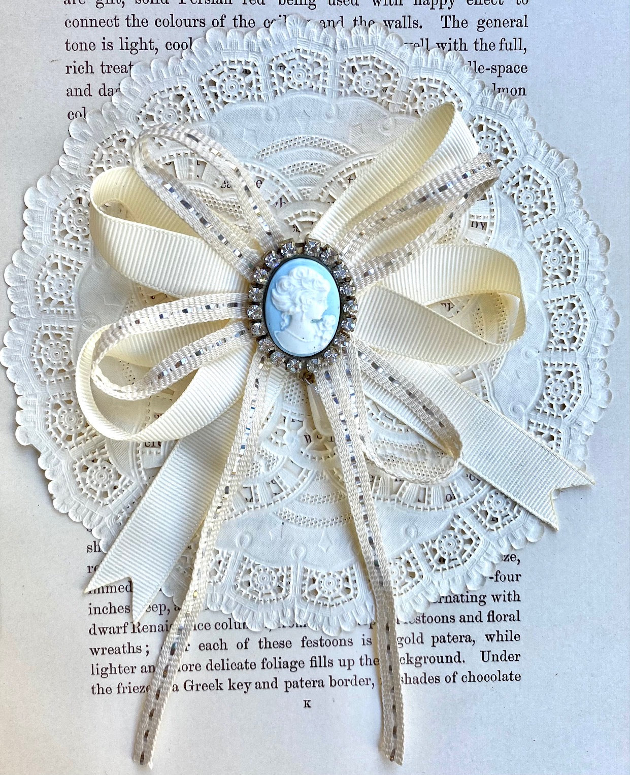 Vintage cameo and ribbon brooch.