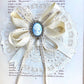 Vintage cameo and ribbon brooch.