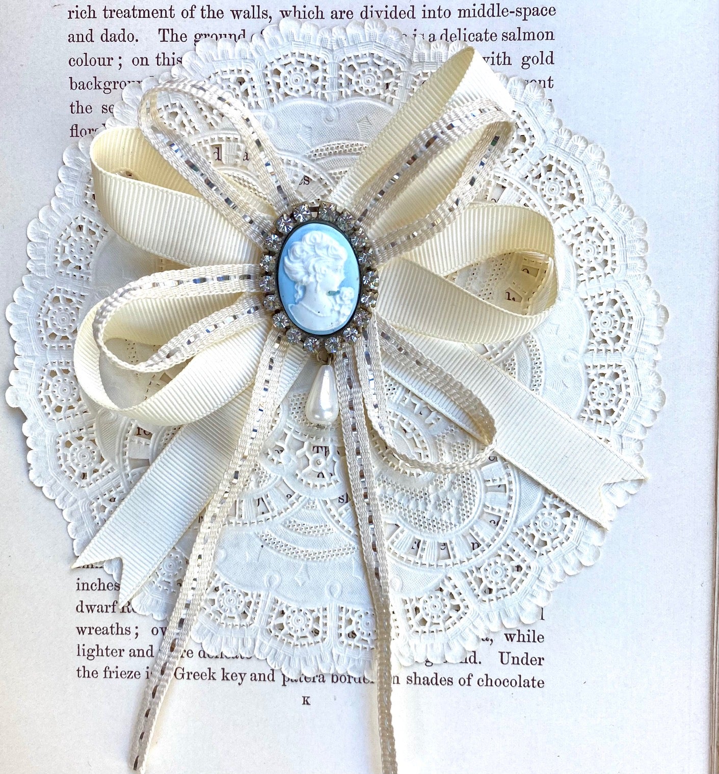 Vintage cameo and ribbon brooch.