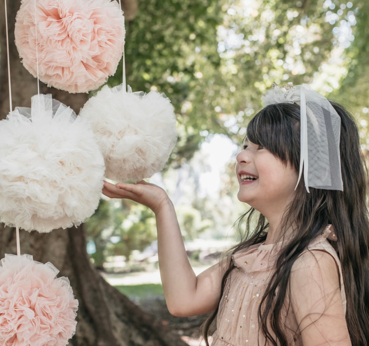 Hanging Tulle Pom Pom. Pink and cream.