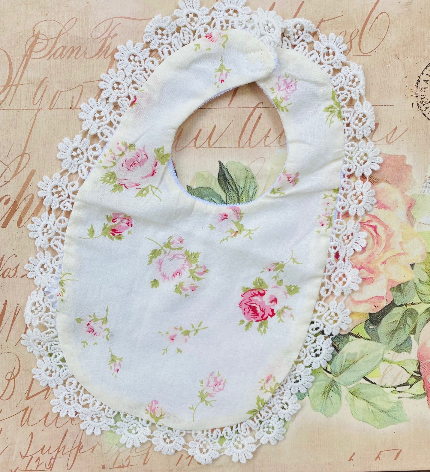 Baby bib. floral prints.