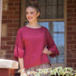 Ellie Lace ruffled sleeve top.  Berry