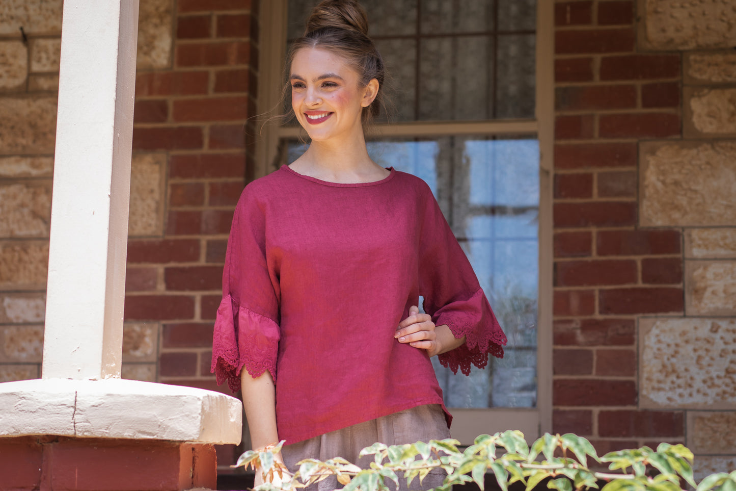 Ellie Lace ruffled sleeve top.  Berry