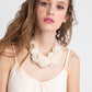 Pearl and velvet necklace.