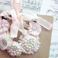 Pearl and velvet necklace.